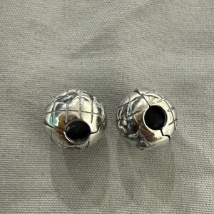 SOLD - Pandora Globe Stopper